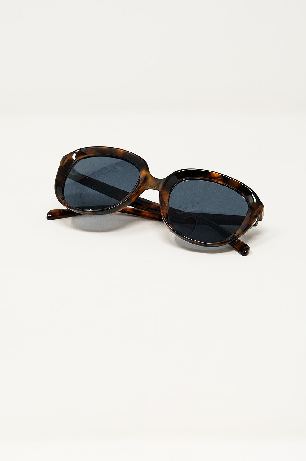Gafas de sol redondas en carey oscuro