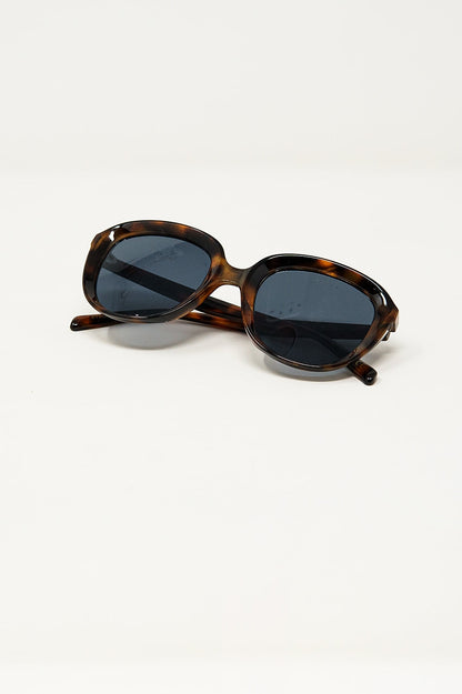 Gafas de sol redondas en carey oscuro