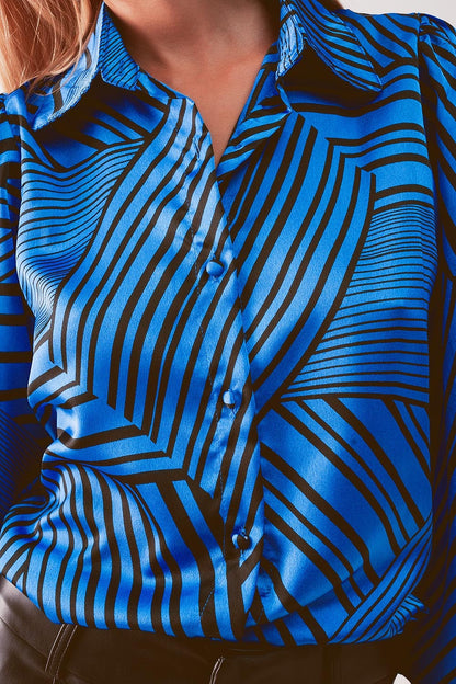 Blusa estampada con mangas abullonadas en color azul