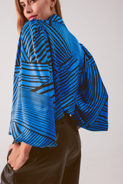 Blusa estampada con mangas abullonadas en color azul
