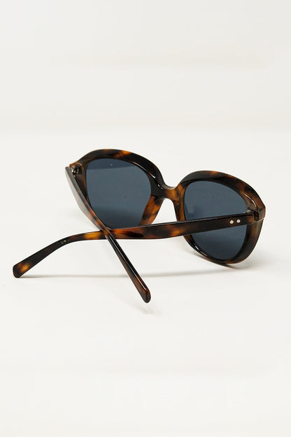 Gafas de sol redondas en carey oscuro