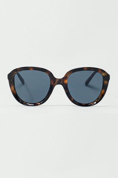 Gafas de sol redondas en carey oscuro