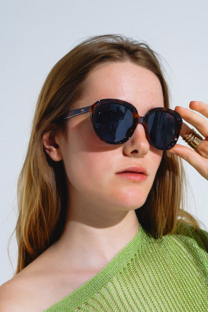 Gafas de sol redondas en carey oscuro